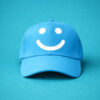 Blue cap with white smile