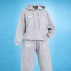 Light grey tracksuit with white smile logos