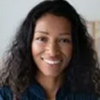 Woman with curly hair and smile