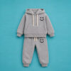 Tracksuit Kids - Top Left Smile